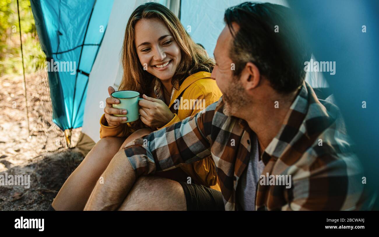 Smiling mature woman camping in hi-res stock photography and images - Alamy