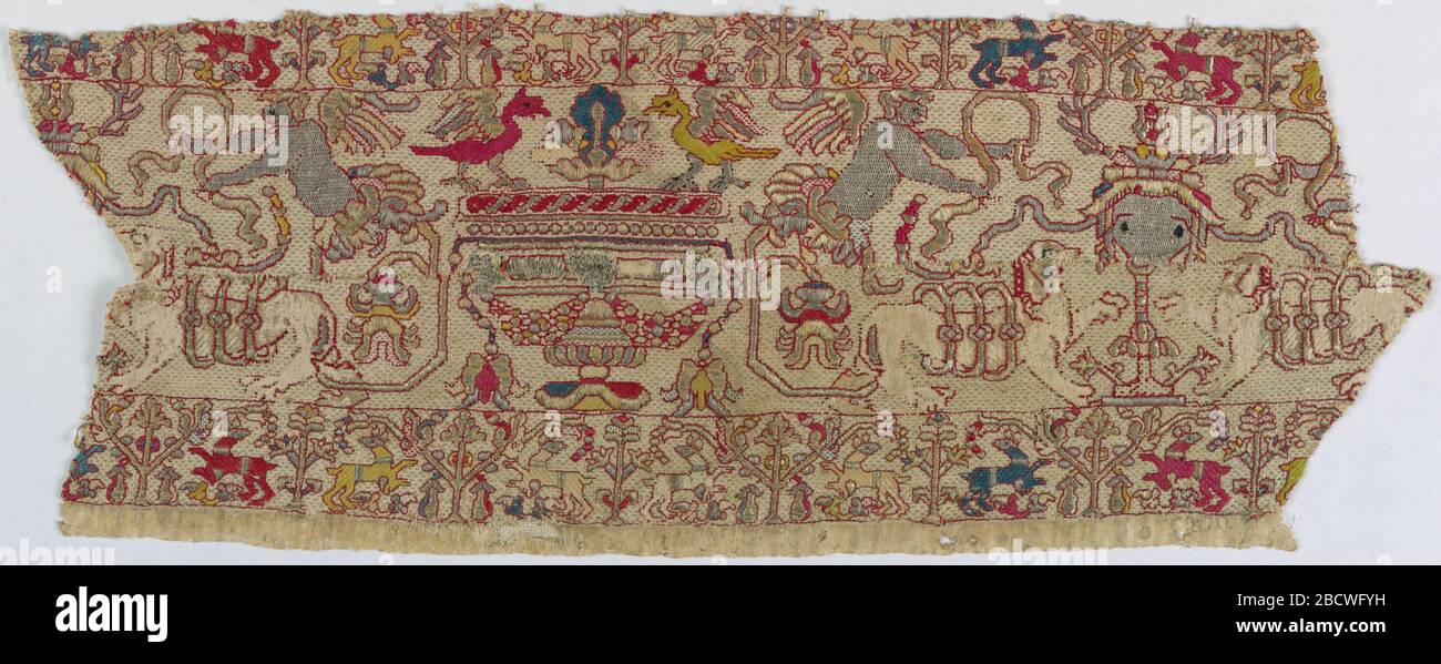 Band. Research in ProgressLinen band embroidered in colored silks and gold thread. Pattern is symmetrical with a design of central fountain with birds to the right and left. Above are winged figures with ribbons. Narrow border below of trees and animals. Band Stock Photo