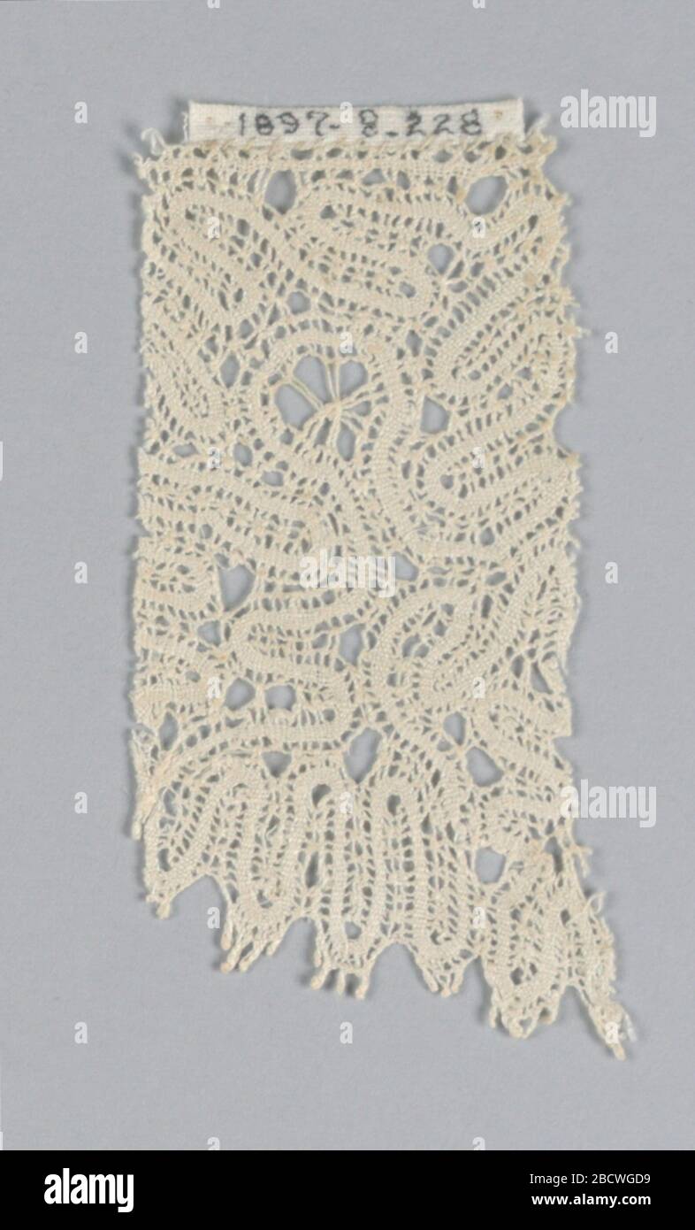 Fragment. Research in ProgressFine, wavy, ribbon-like scrolling design ...