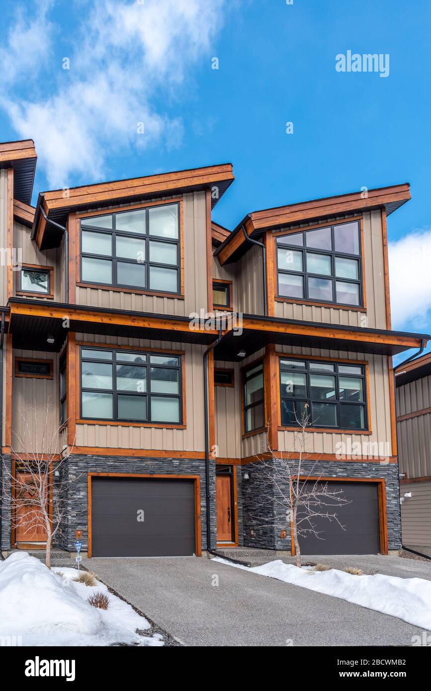 Luxury homes in the mountain town of Canmore Alberta during winter. Canmore is a popular