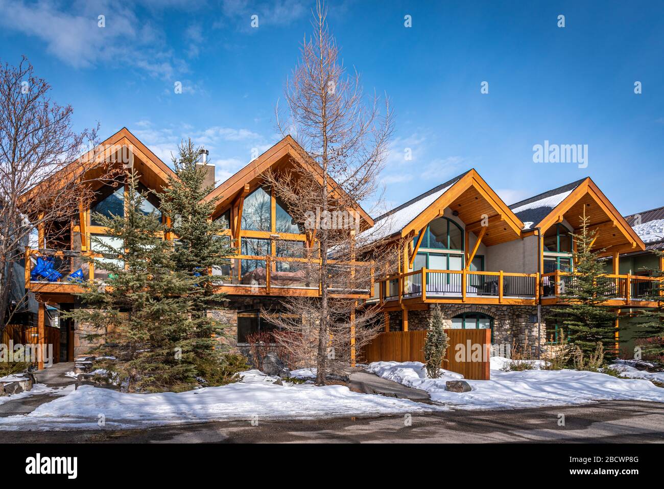 Luxury homes in the mountain town of Canmore Alberta during winter. Canmore  is a popular mountain destination in Alberta Canada Stock Photo - Alamy