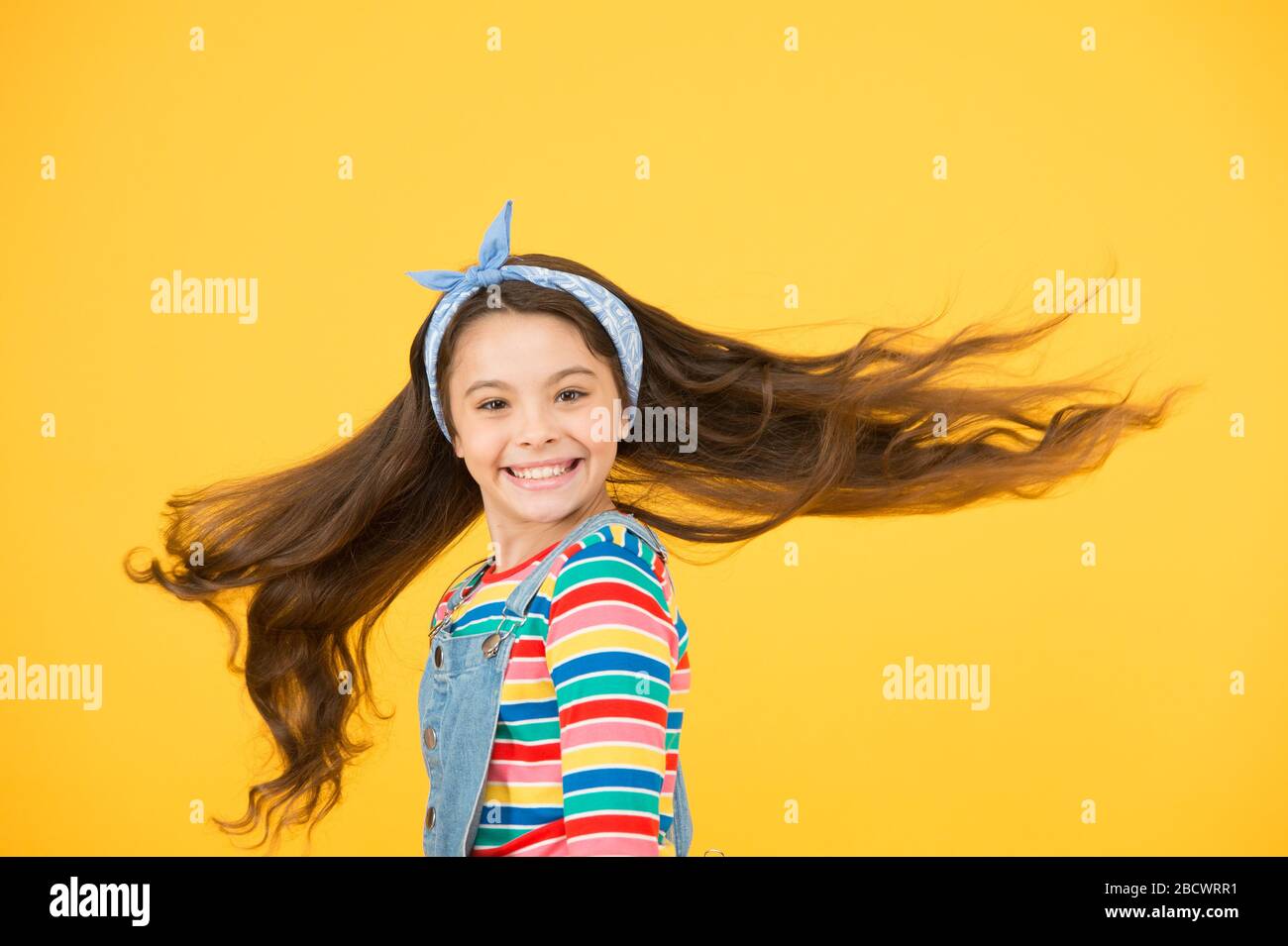 Summer Kid Fashion Be Positive And Stylish This Spring Female Accessory For Trendy Look Childhood Happiness Child Has Long Curly Hair Happy Little Girl Wear Retro Headscarf Her Perfect Style Stock Photo
