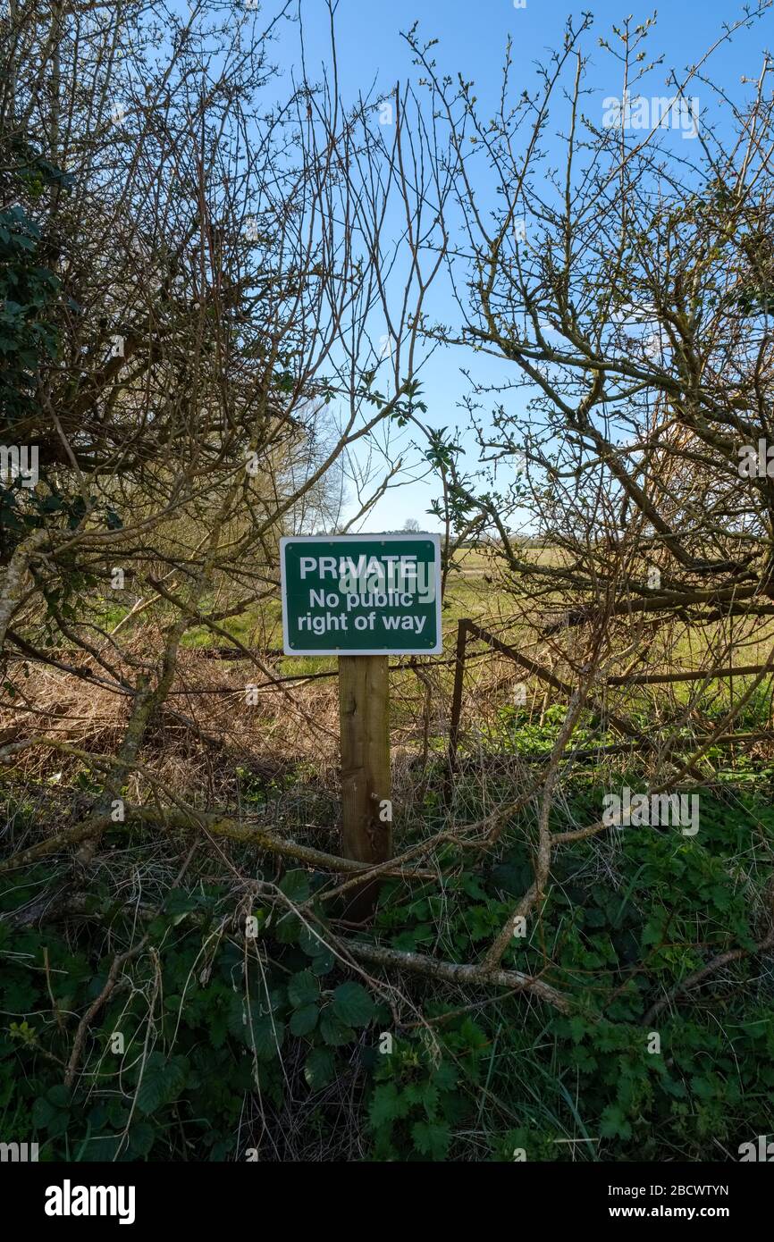 Private, no right of way sign at the edge of a farmers field in Warwickshire, UK Stock Photo