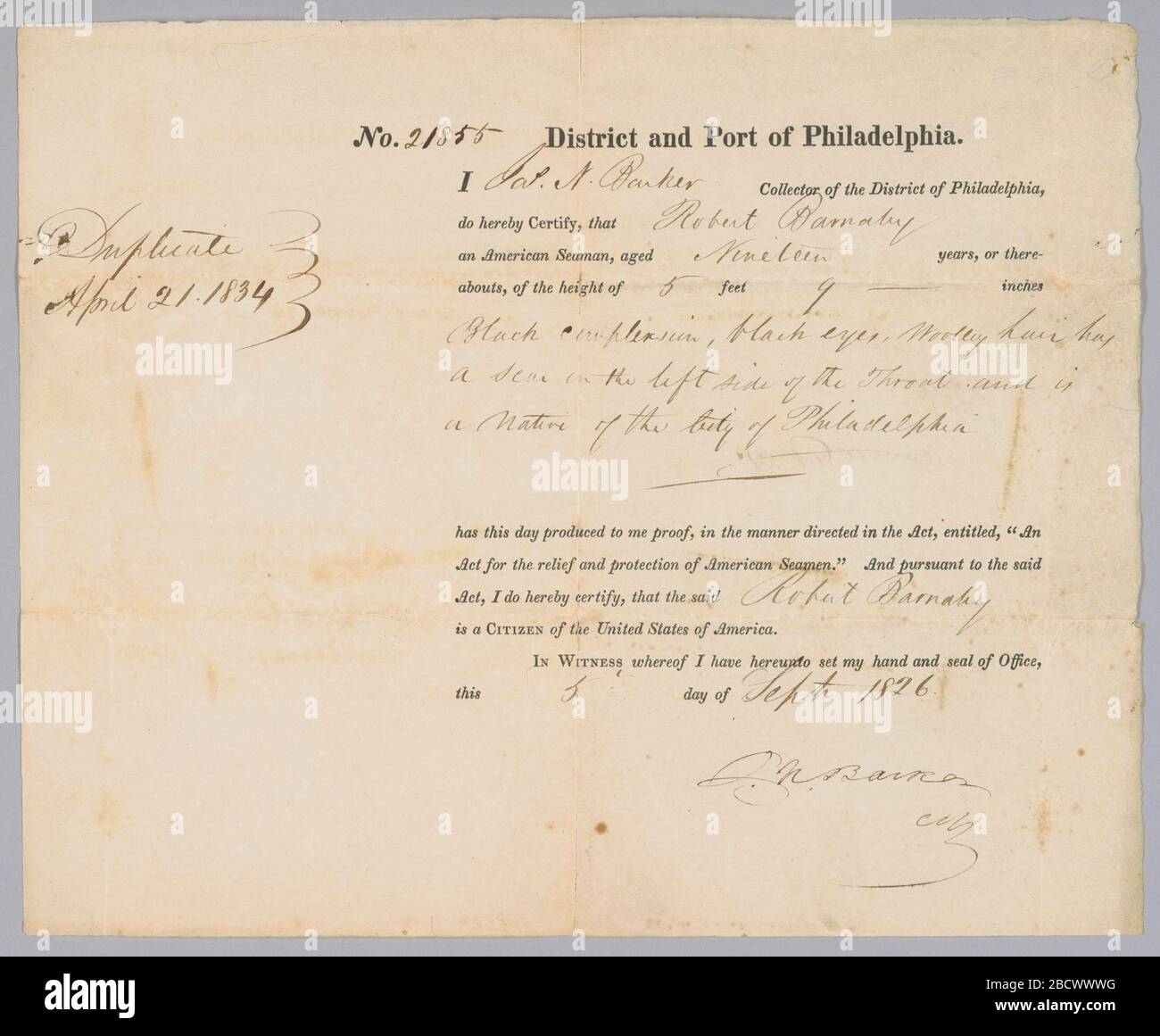 Seamans Protection Certificate for Robert Barnaby. Originally issued in 1826, this is an official copy of an early manuscript Seaman's Protection Certificate for Robert Barnaby (April 21, 1834). The certificate describes him as as 'a Citizen of the United States of America,' with 'black complexion, black eyes, wooly hair.' Seamans Protection Certificate for Robert Barnaby Stock Photo