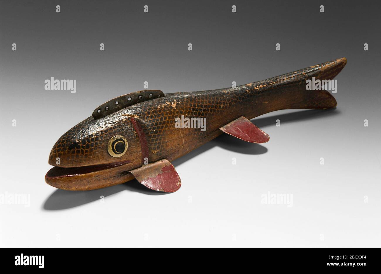 Fish Decoy. Carved fish decoys are one of the earliest forms of American  folk art. Hunters around the Bering Sea first used small bone or ivory  decoys for ice fishing around 1000