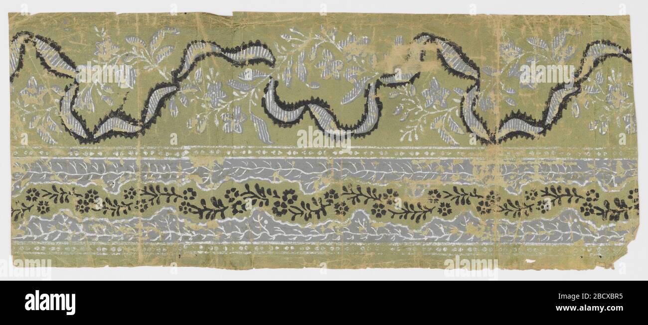 Border. Research in ProgressWide upper band containing ribbon intertwined with vining foliage. Bottom band has lacy look - with central band of vining floral between two edge bands on vining foliage. Bands of beading above and below this bottom band. Border Stock Photo