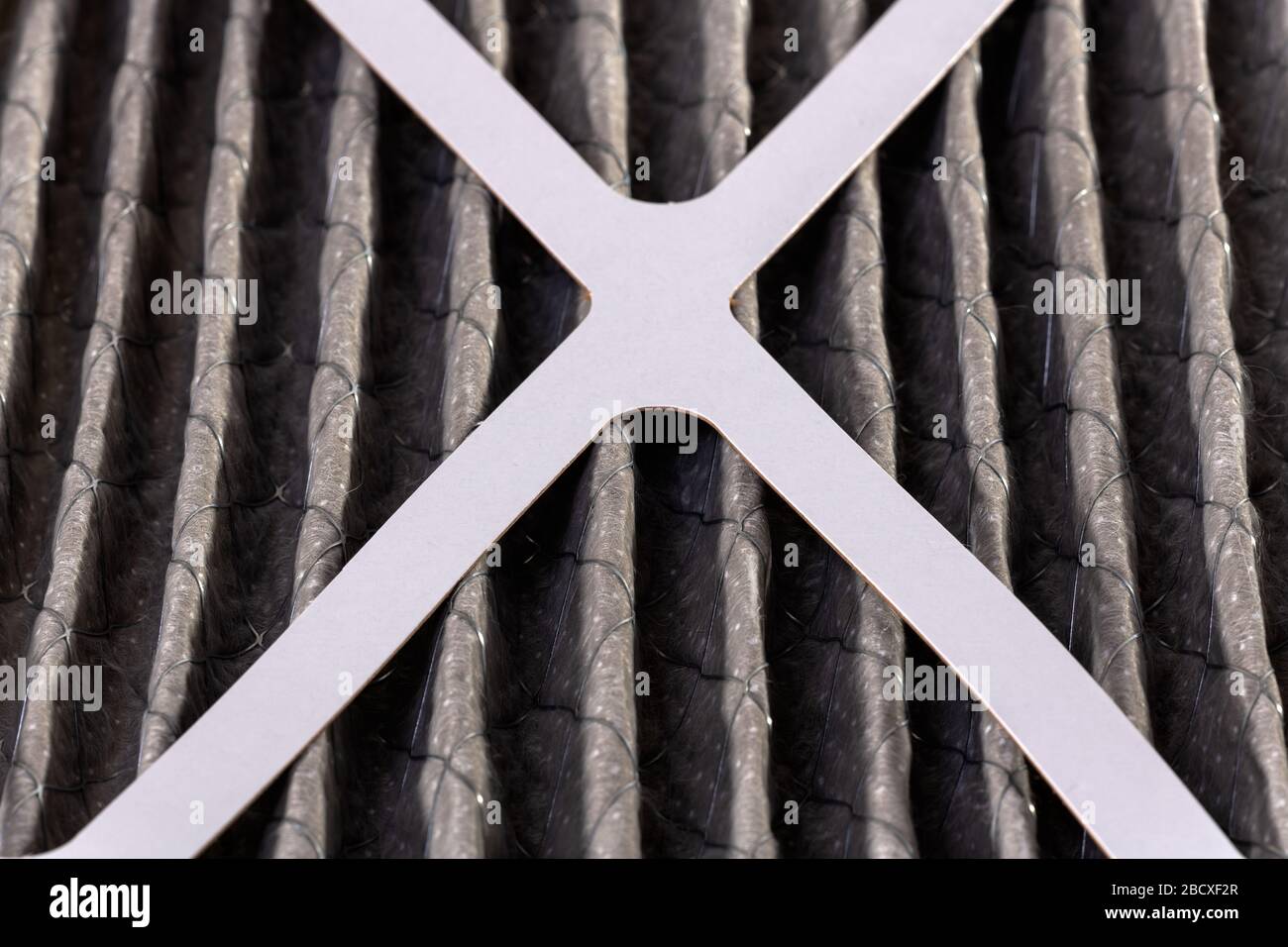 Close up of home air filter showing the dirt and particle cause bacteria inflection and sickness
