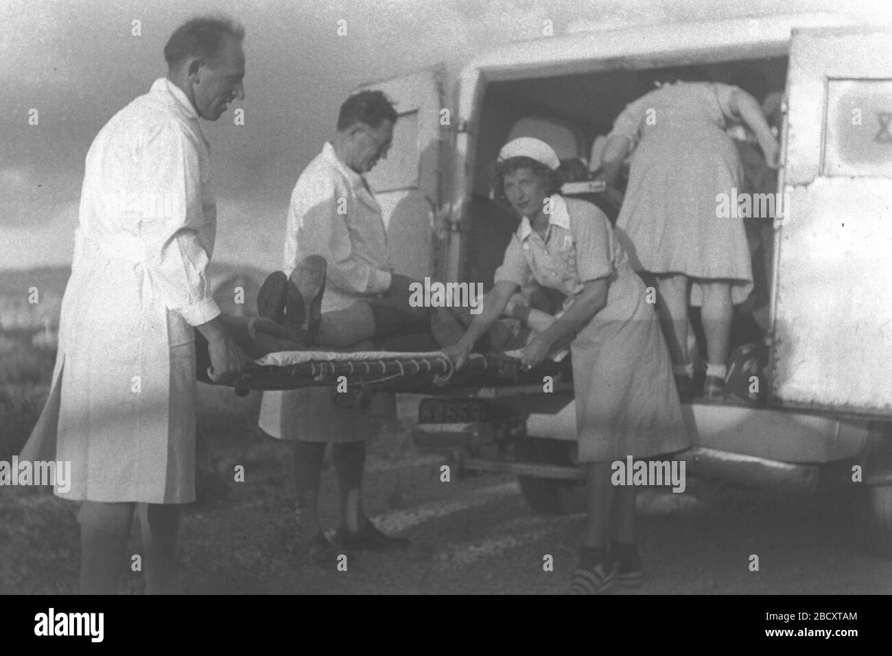 English A Sick Immigrant Being Transferred By Ambulance To The Reception Camp At Atlit I U I O I C U I E U E E U E I U U U O I I I U O U E U O 14 July 1944 This Is Available From National