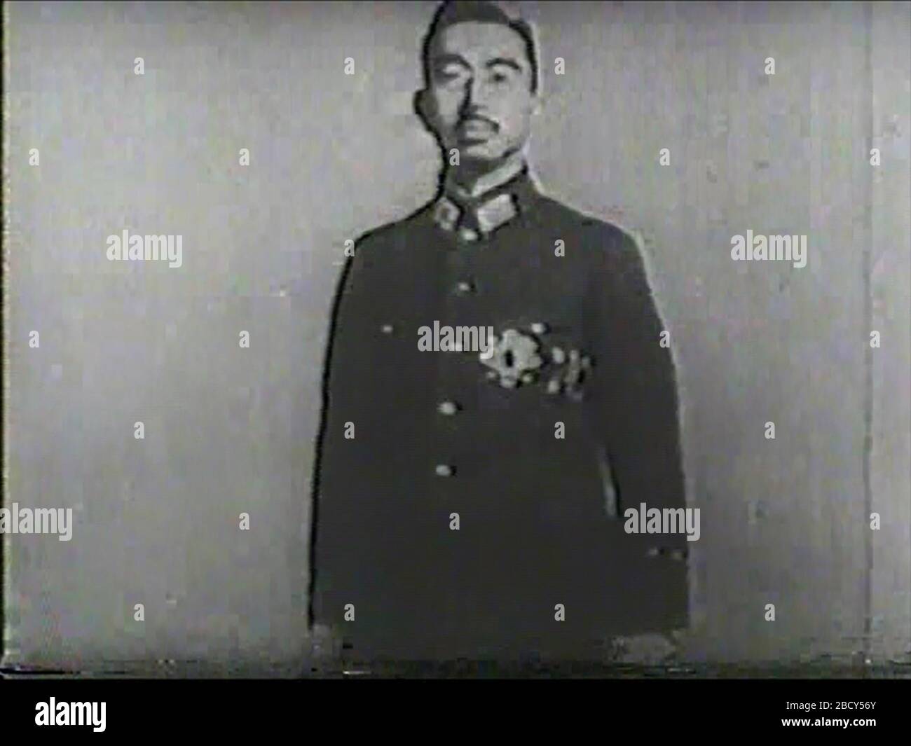 English Hirohito Military Uniform Ver From A Japanese Tragedy 1946 Japanese Film 日本語 映画 日本の悲劇 昭和天皇の 軍服姿から平服姿に切り替わるシーン その1 一連のシーンが吉田茂の憤激を買ったという説がある 1946 Screenshot 日本映画社