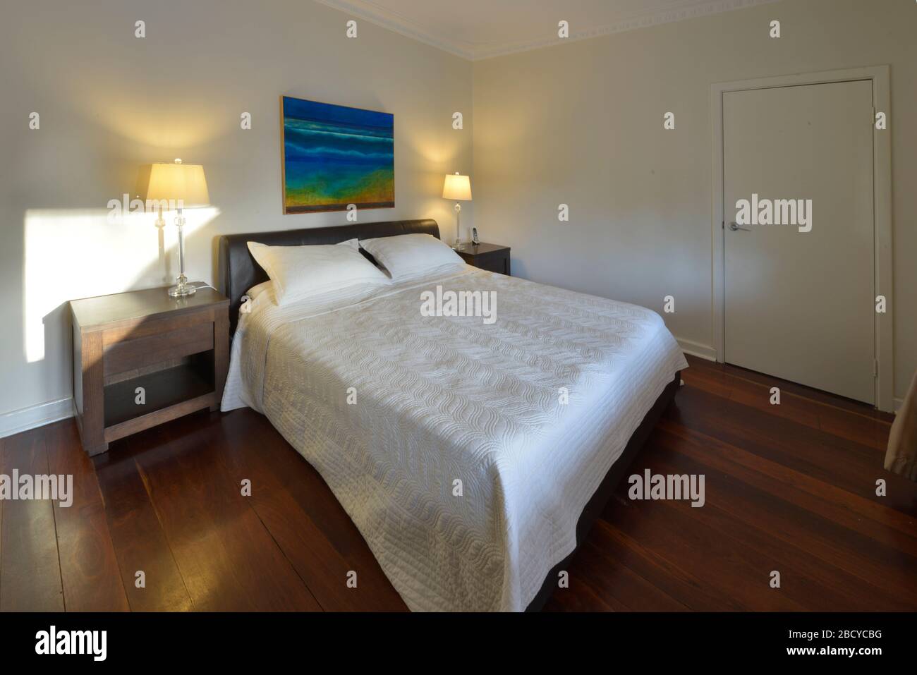 The bedroom of a modern Australian bungalow style family home. Stock Photo