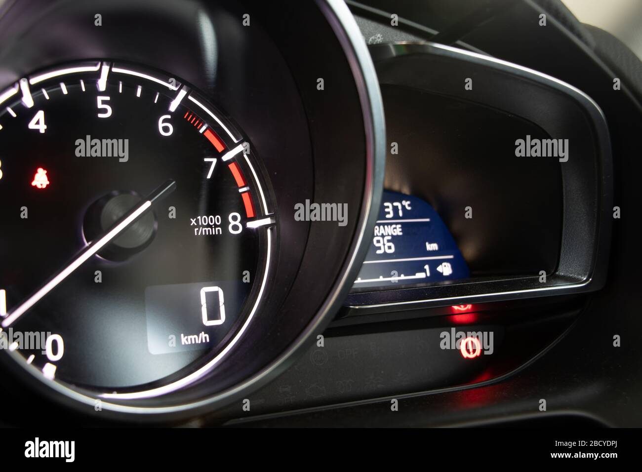 A dashboard with tachometer of car, close up. Dashboard in vehicle with