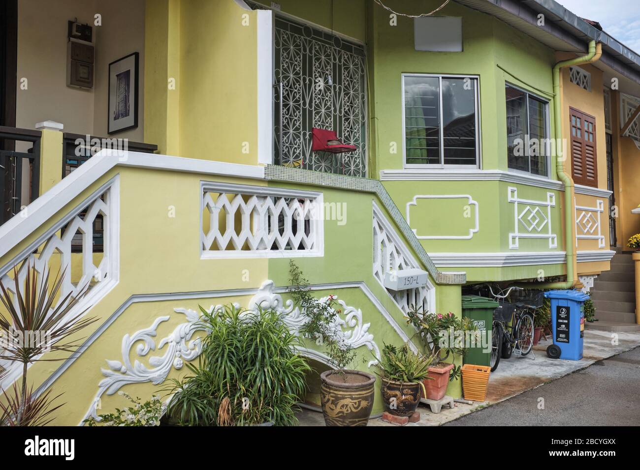 Colonial era semi-detached bungalows in Kuo Chuan Avenue, off East Coast Road, Katong, Singapore, freshly painted and renovated Stock Photo