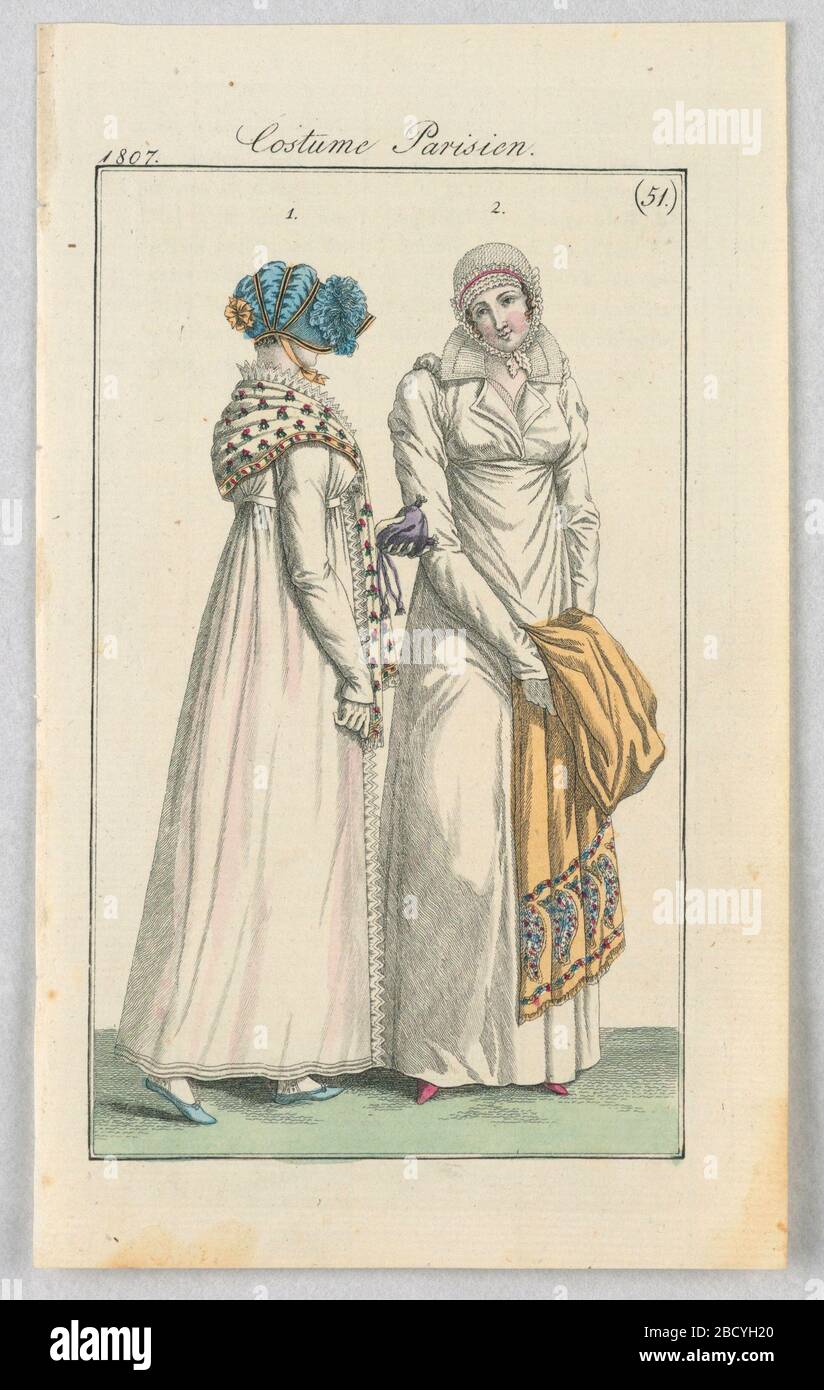 Plate 51 Costume Parisien Parisian Costume Journal des Dames et des Modes Journal of Ladies and Fashion. Research in ProgressFashion illustration featuring two women wearing long, white dresses standing next to each other. The woman on the right faces the viewer and tilts her head slightly towards the left, holding a yellow shawl with a colorful paisley print at the bottom. Plate 51 Costume Parisien Parisian Costume Journal des Dames et des Modes Journal of Ladies and Fashion Stock Photo