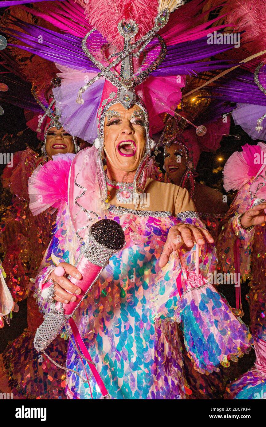 Las Celias de Tenerife, a group of men paying tribute to the singer Celia  Cruz, presenting their costumes during the Announcing Parade of the  Carnival Stock Photo - Alamy