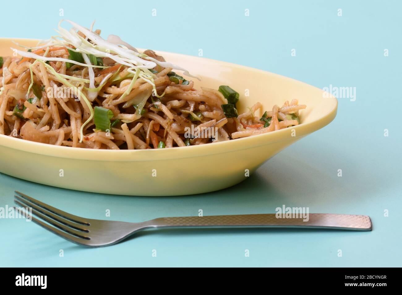 Vegetable Hakka Noodles or Manchurian Hakka or Schezwan Noodles or chow mein is a popular