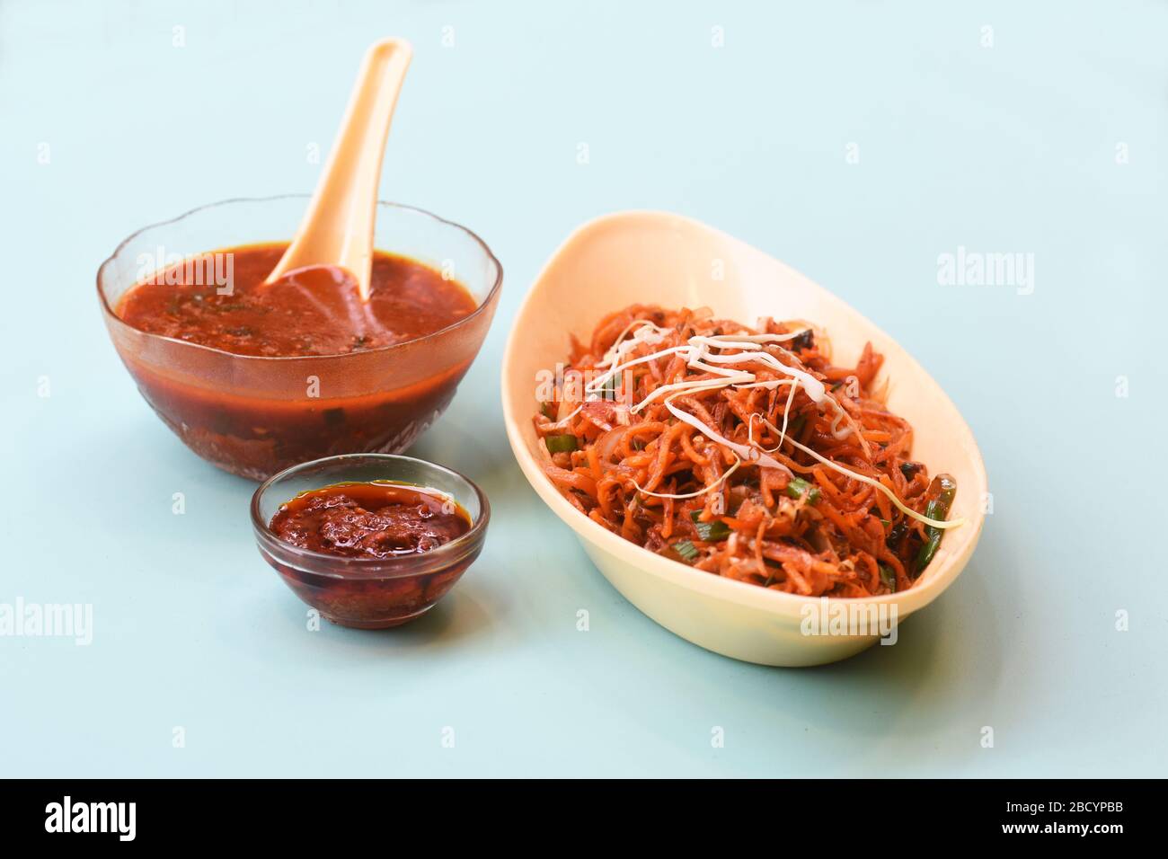 Schezwan Noodles or Manchurian Hakka or vegetable Hakka Noodles or chow mein is a popular