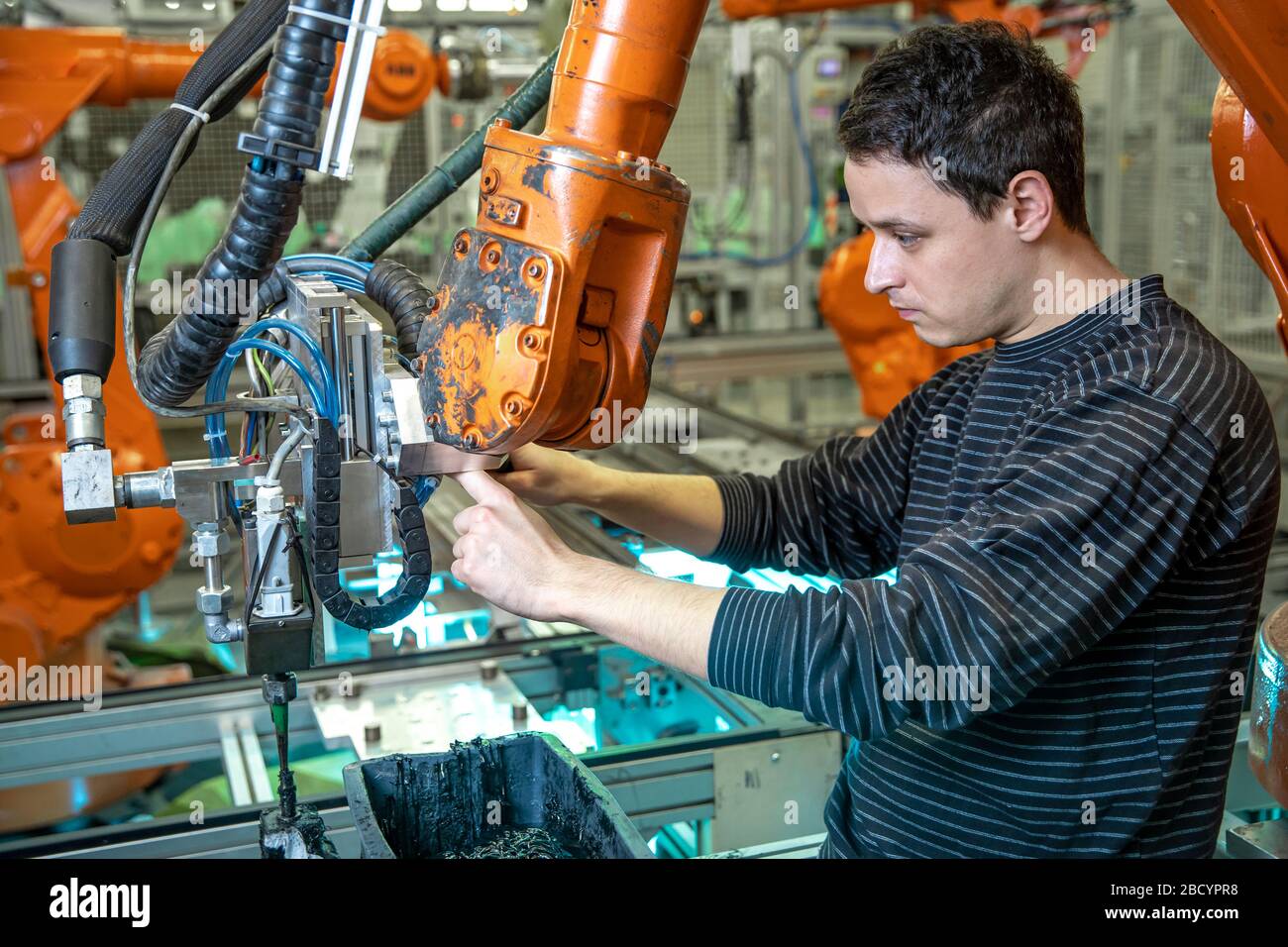 robotization of modern industry in the factory. Introduction of new