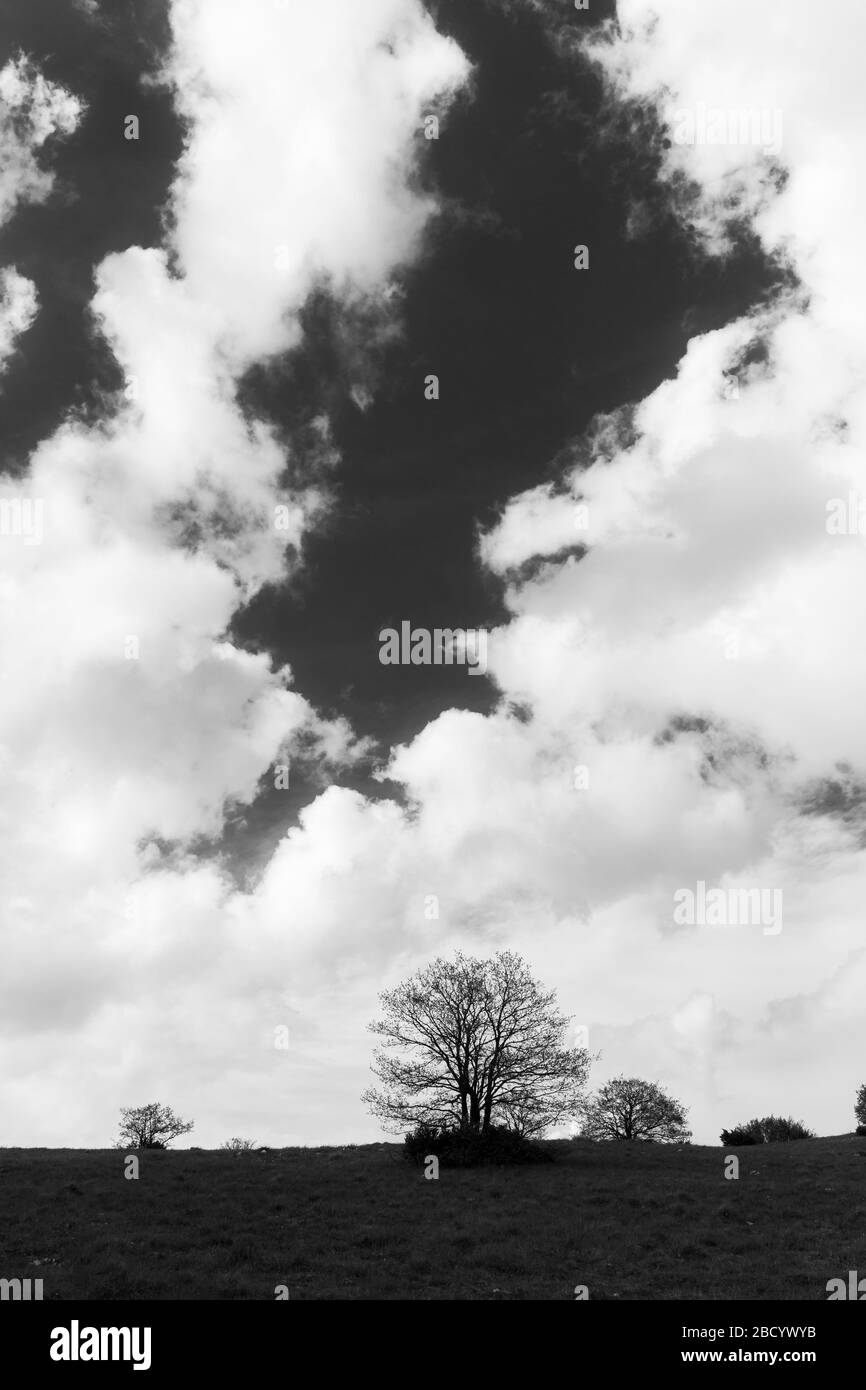 Clouds over hill monochrome Black and White Stock Photos & Images - Alamy