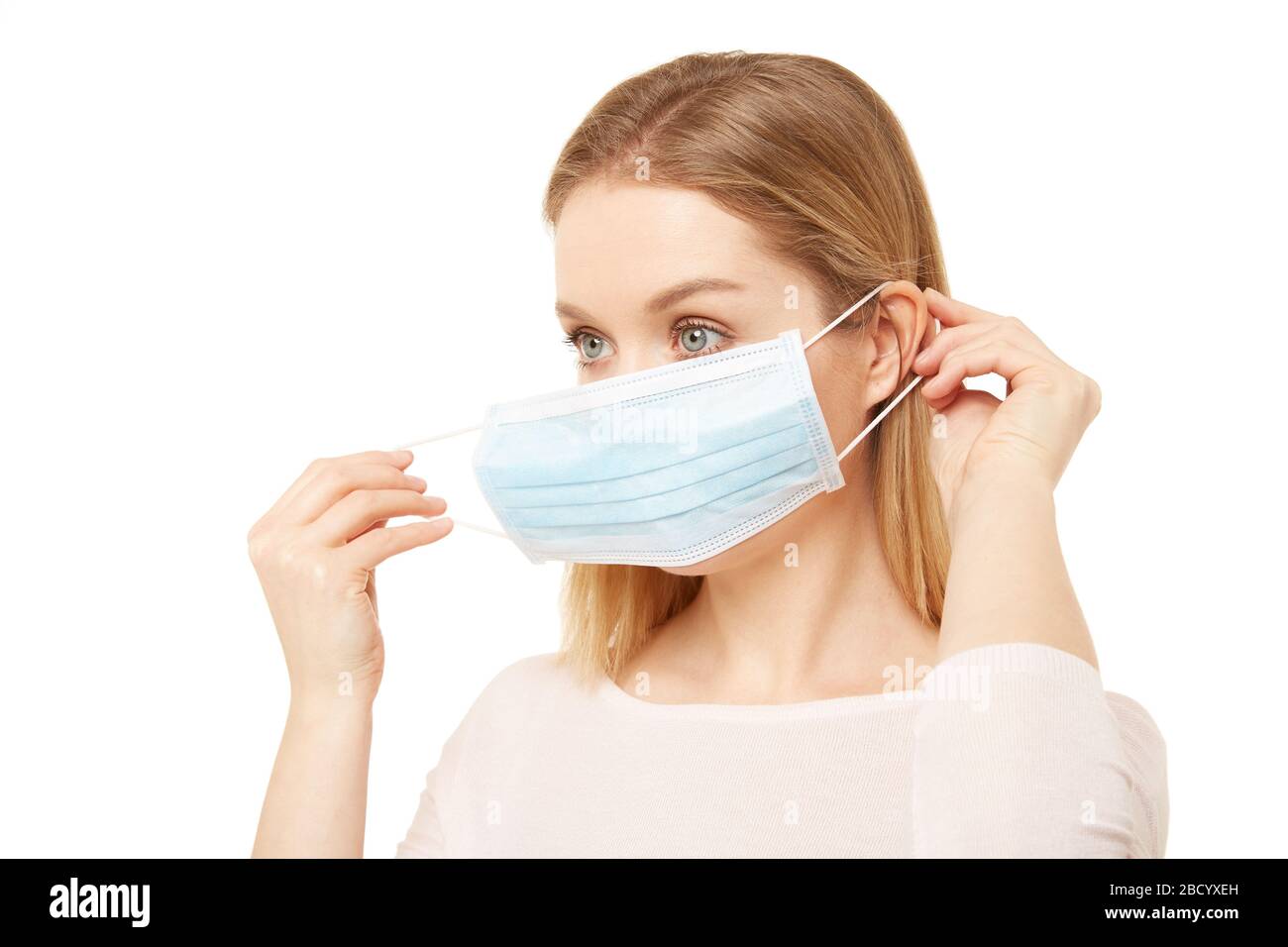 Doctor woman puts on medical hi-res stock photography and images - Alamy