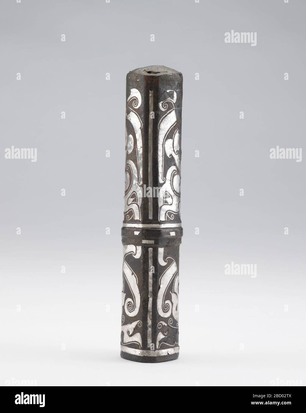 ; China; 475-221 B.C.E.; Bronze with silver inlay; H x W: 18.1 x 4 cm (7 1/8 x 1 9/16 in); Gift of Charles Lang Freer Pole fitting Stock Photo