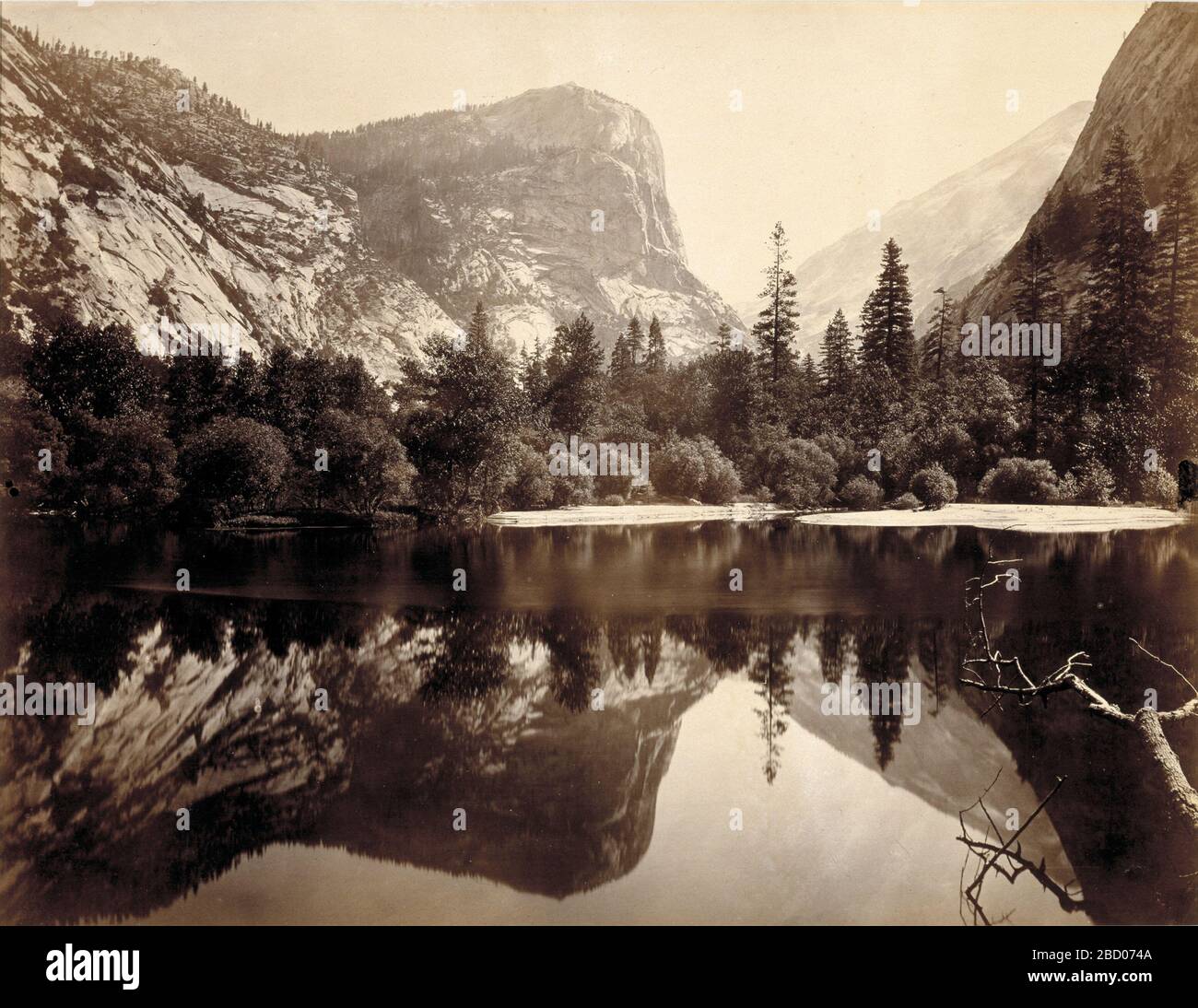 Mirror Lake and Reflections Yosemite Valley Mariposa County California. Like Carleton Watkins, his better-known competitor, Charles Weed recognized the pictorial dividend to be gained by showing Yosemite’s glorious geological features in duplicate, using the valley’s lakes as reflecting ponds. Stock Photo