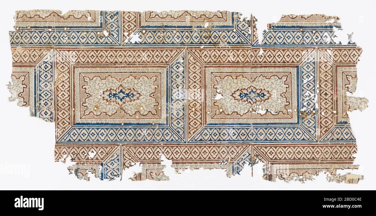 Sidewall fragment. Research in ProgressVariant of a brick or ashlar block pattern, printed in reddish-brown, blue and gray on white polished ground, horizontal rectangles arranged like stones in a wall, made up of scrollwork. Sidewall fragment Stock Photo