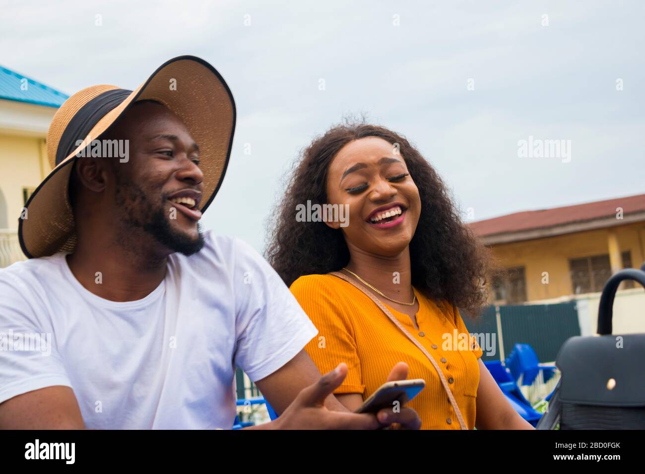 African woman laughing exciting hi-res stock photography and images - Alamy