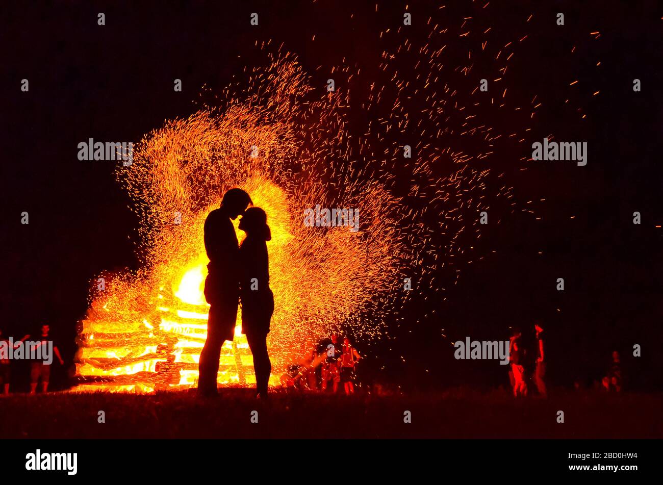 silhouette of loving couple in fire background. Original wallpaper,  valentine or wedding theme Stock Photo - Alamy