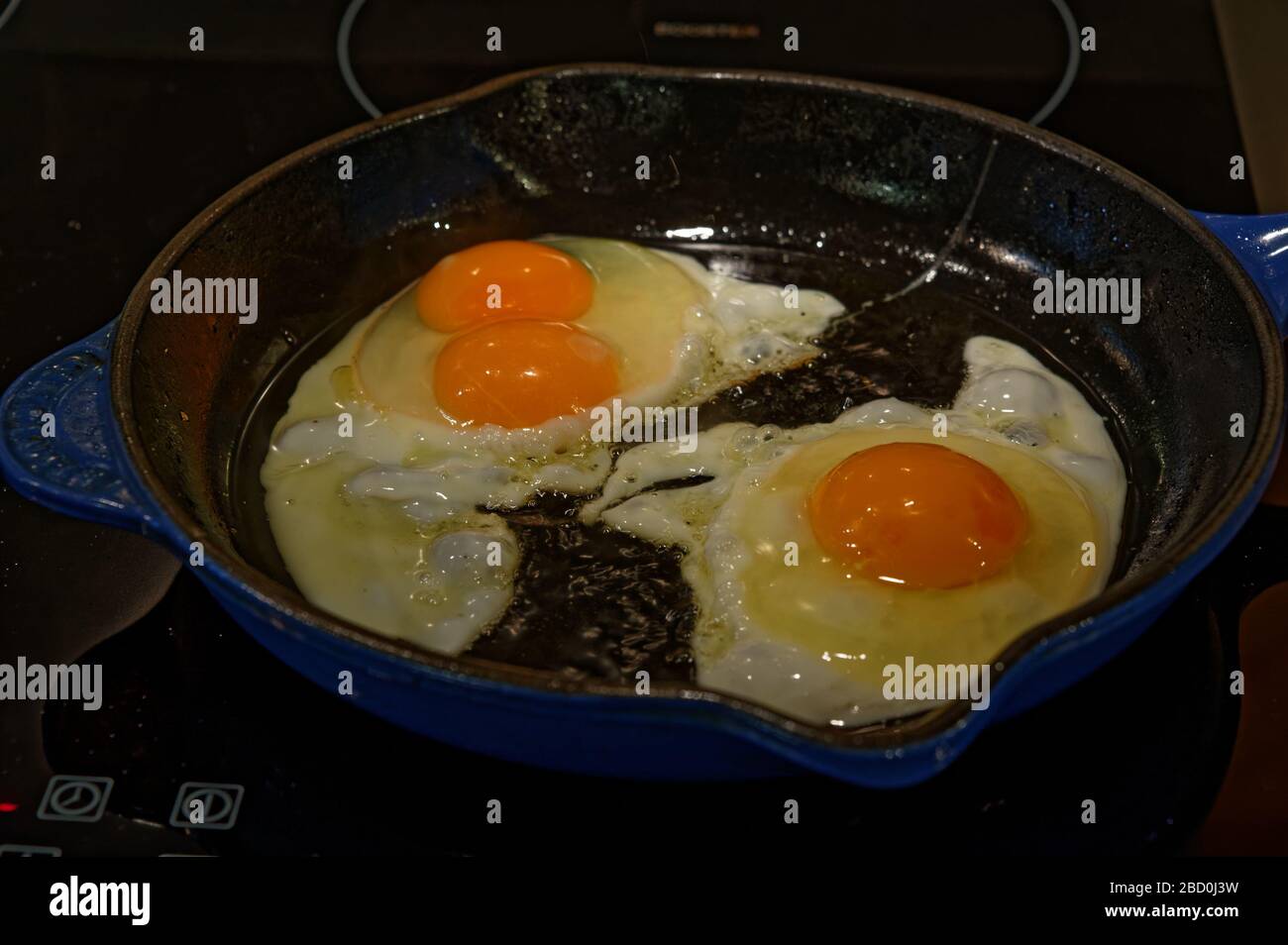 If superstitious a double yolked egg is meant to signify a pregnancy in the family Stock Photo
