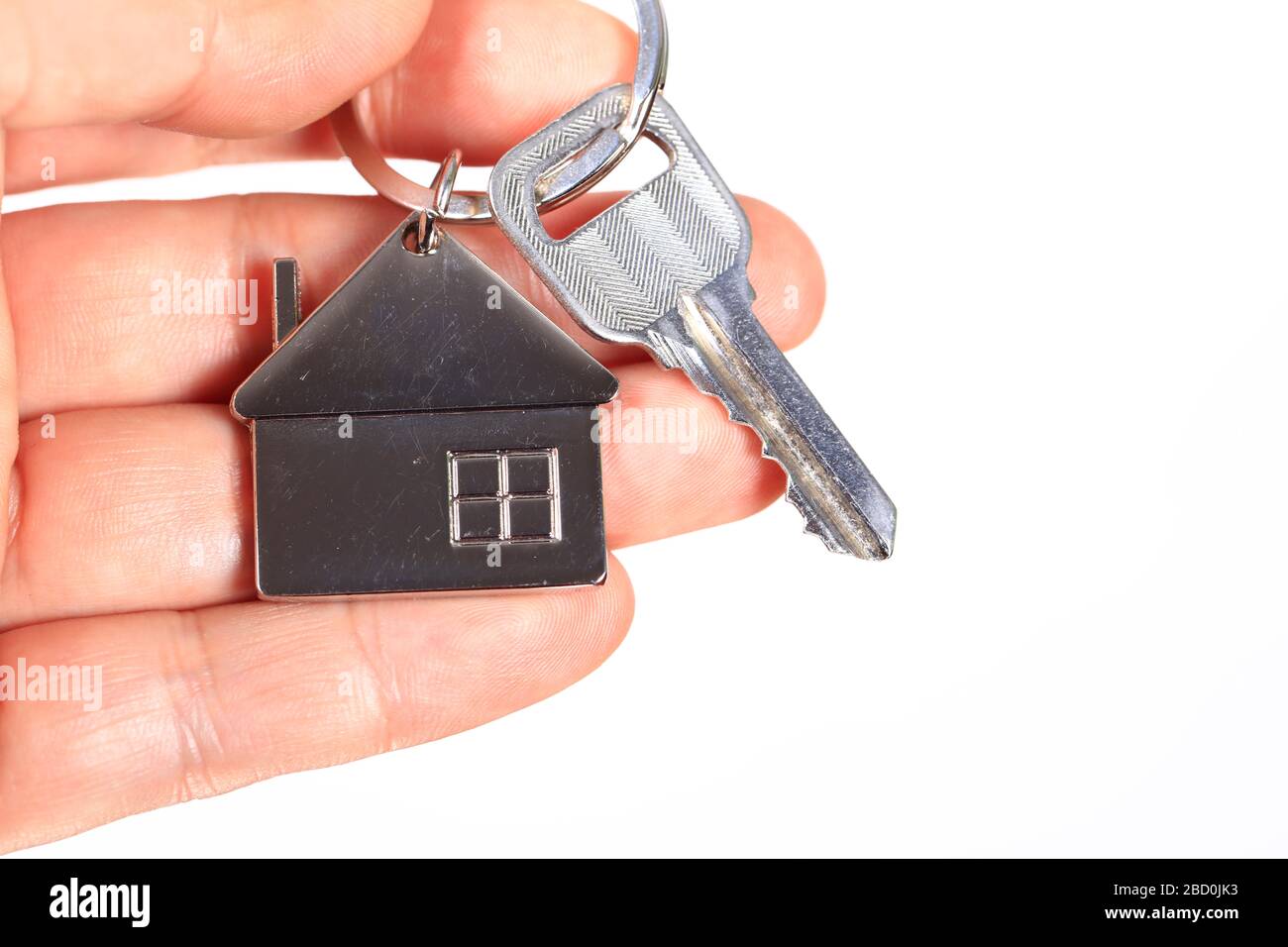 Man hand house model and the key, the dollar background Stock Photo - Alamy