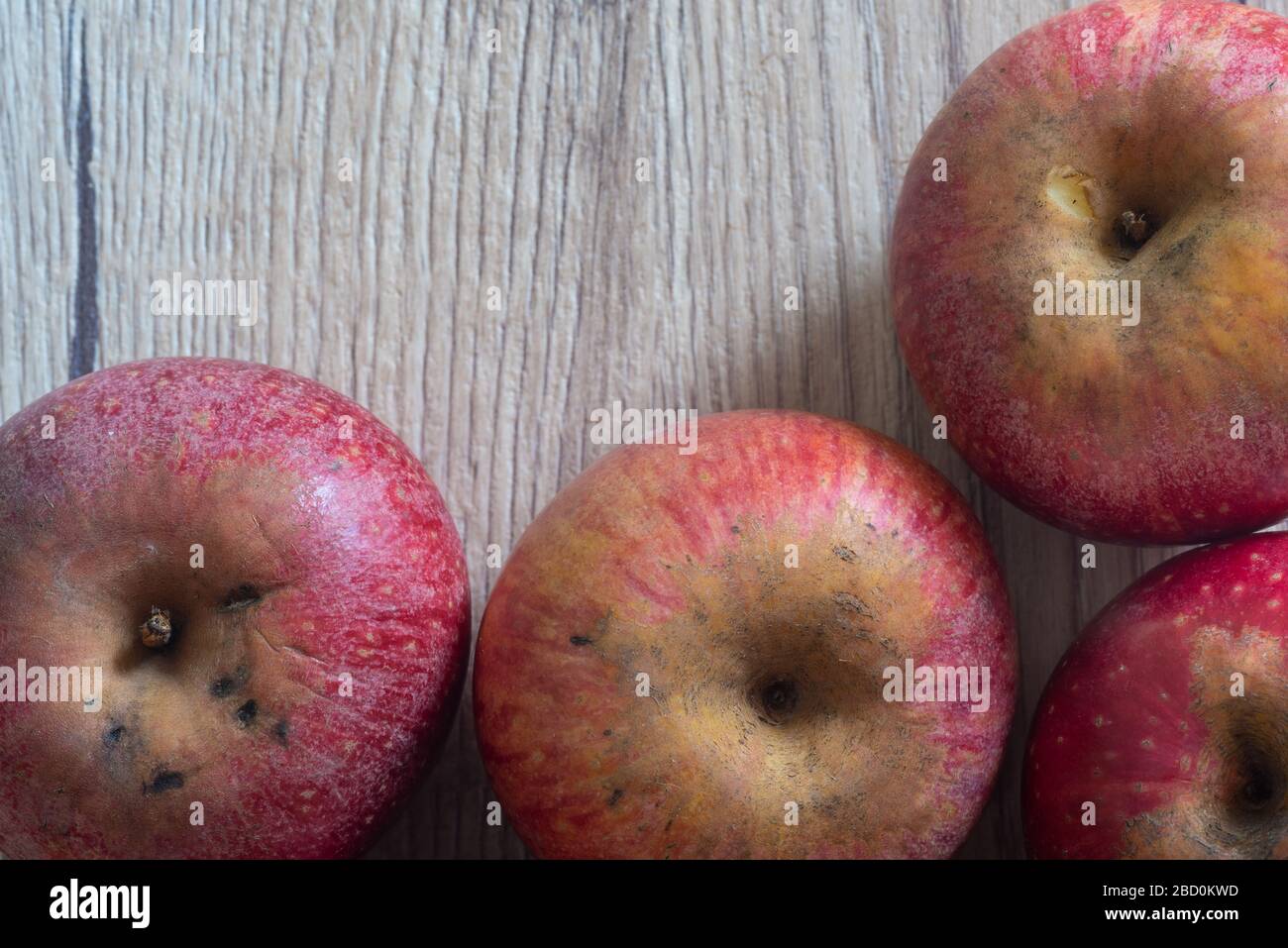 Apples on a wood table suitable as background with copyspace. Stock Photo