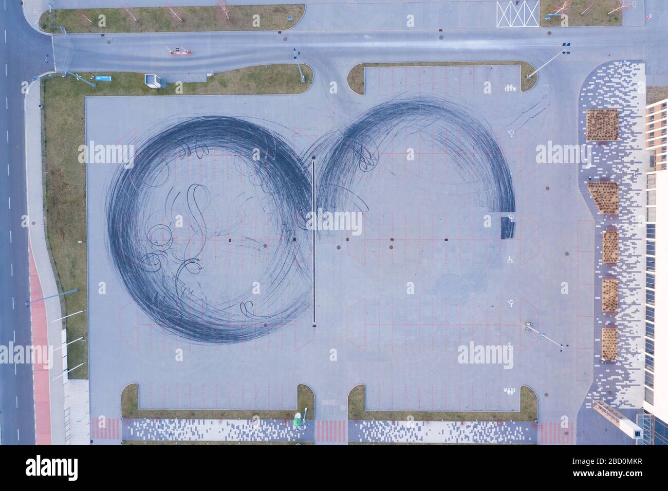 Car drift skid marks on empty parking lot, aerial drone top view Stock  Photo - Alamy