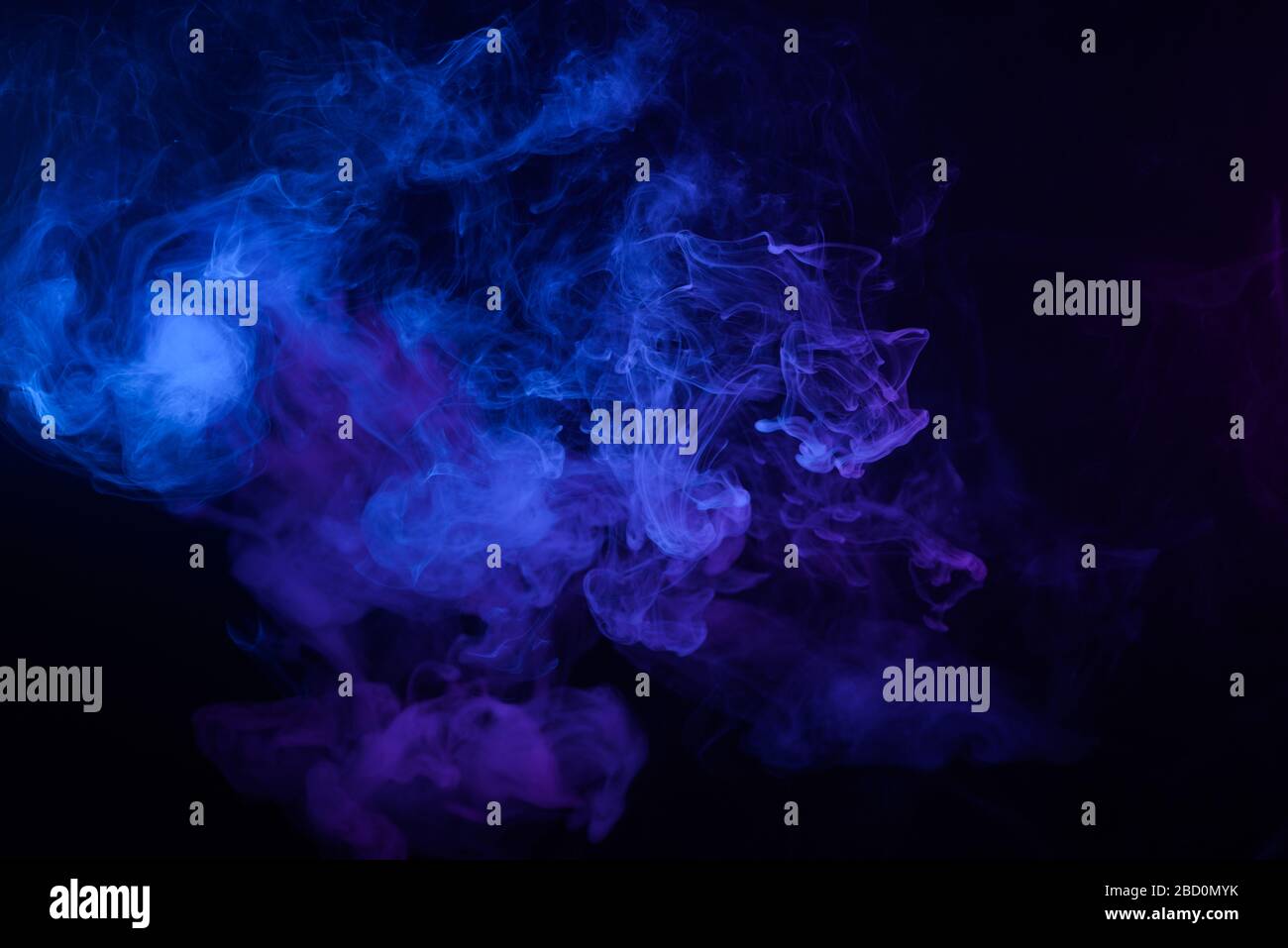 Clouds of blue smoke abstract background Stock Photo - Alamy