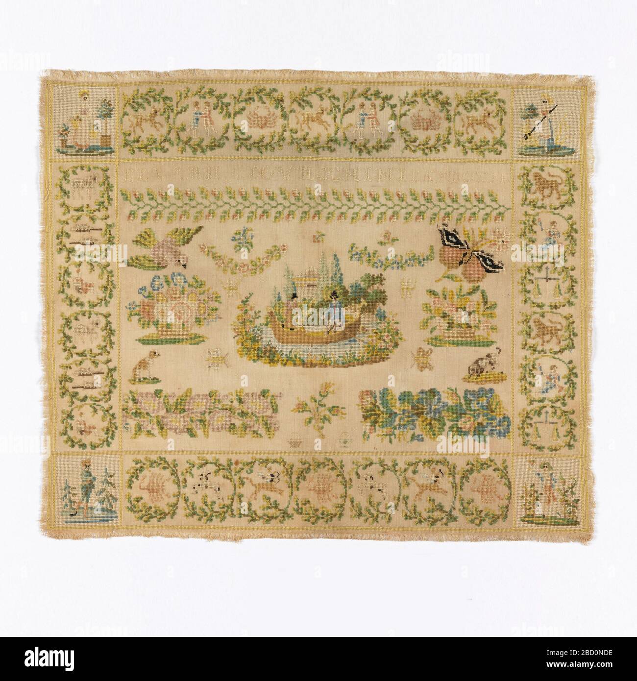 Sampler. Research in ProgressSignature and floral motifs within 5.5 cm (2 3/16') border of the twelve Zodiac signs divided by season. In each corner is a picture of a person personifying one of the four seasons. Idea of Zodiac border continues from 15th-16th century woven tapestries. Sampler Stock Photo