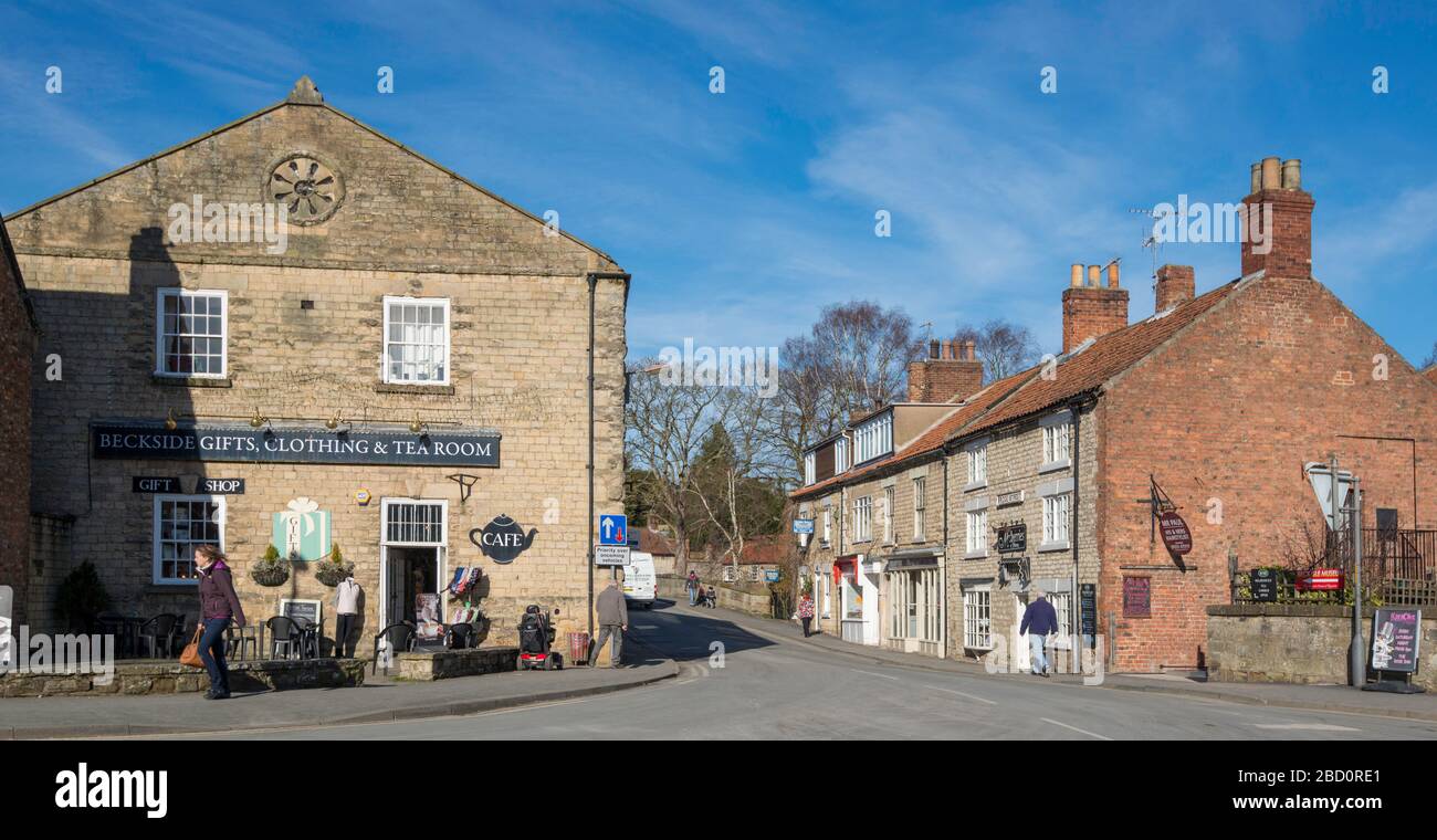 Bridge Street in the centre of Pickering, North Yorkshire with historic buildings now used as shops and a cafe Stock Photo