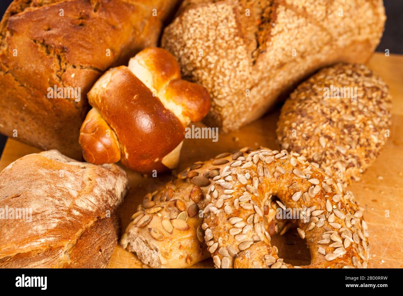 Selection of freshly baked gourmet rolls and loaves of bread Stock Photo
