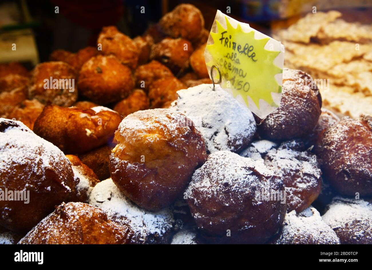 Venice, Italy-February 2020; Close up of Frittelle or fritole; Venetian doughnuts served only during Carnival. They are round, yeast-risen fried pastr Stock Photo
