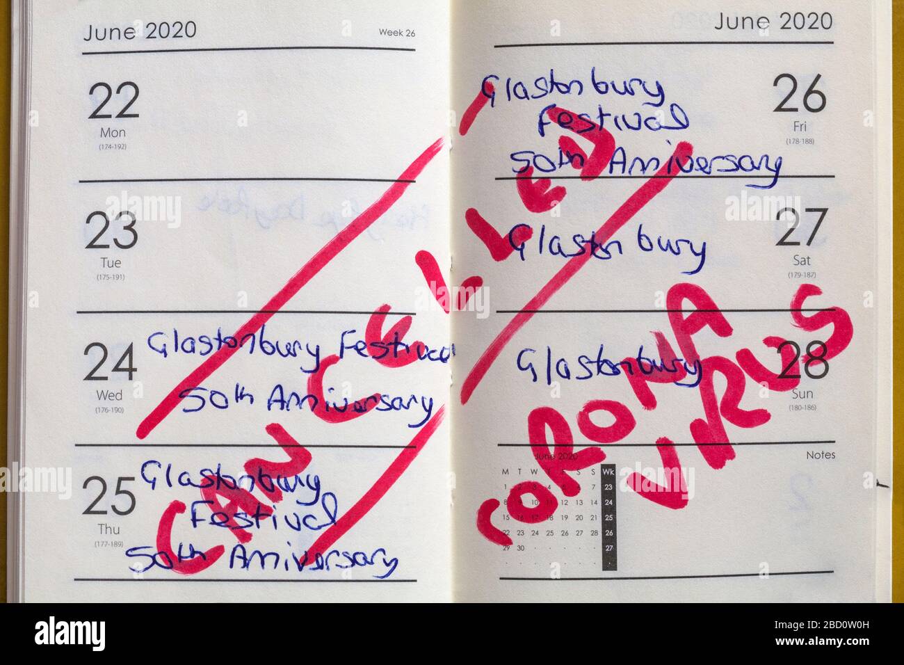 pages in diary showing Glastonbury Festival 50th Anniversary event cancelled as a result of coronavirus, covid 19 virus, pandemic in UK Stock Photo