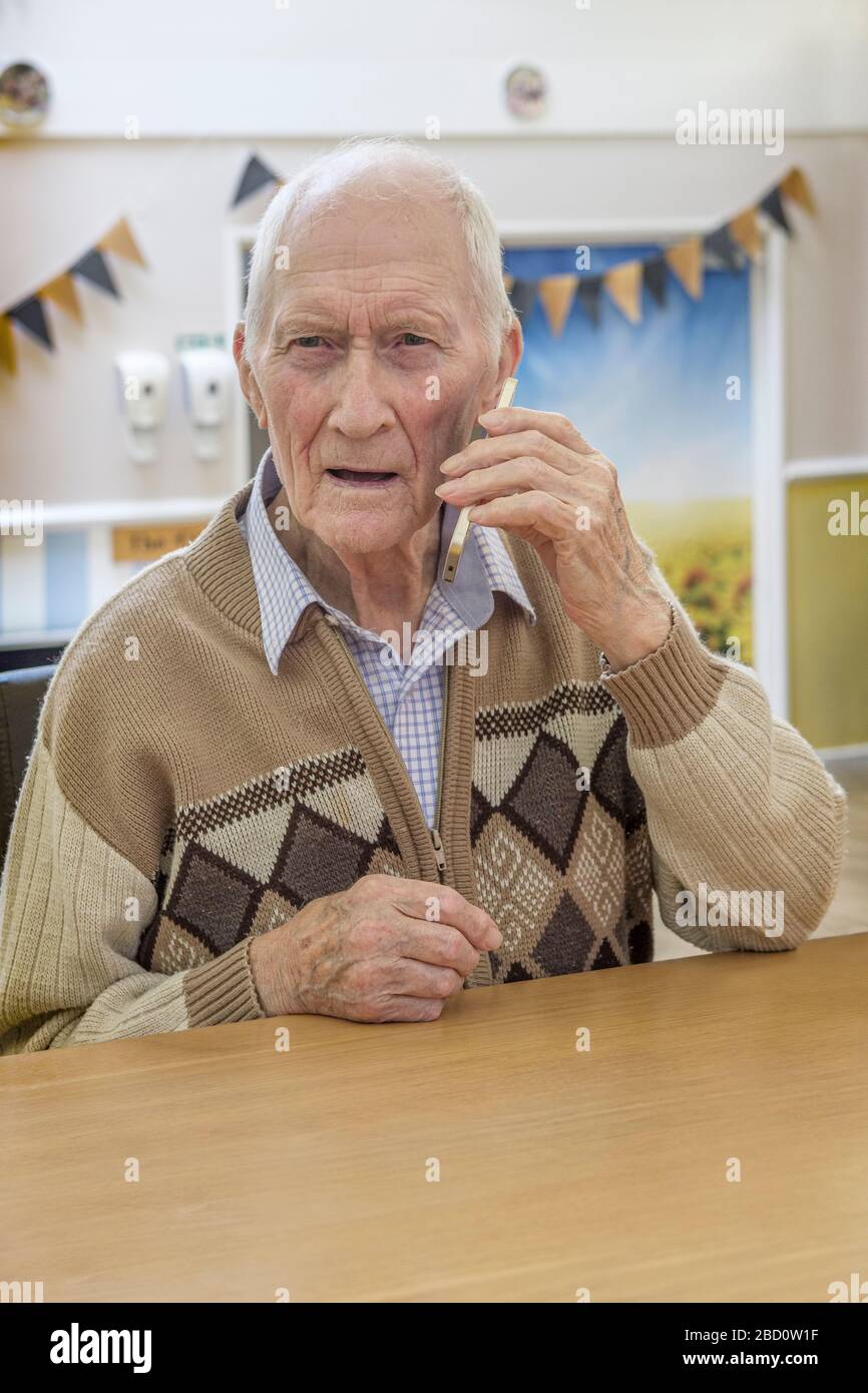 97 year old man on smartphone hi-res stock photography and images - Alamy
