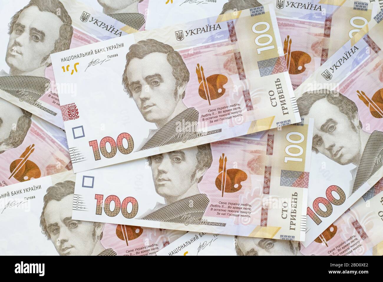 Cash of Ukrainian money, heap of paper banknotes. Pile of hryvnia, uah of national bank of Ukraine Stock Photo