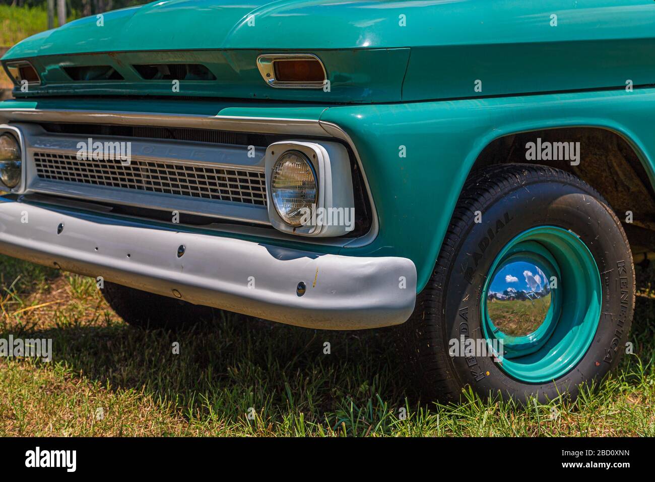 Front End of Green Chevy Truck Stock Photo