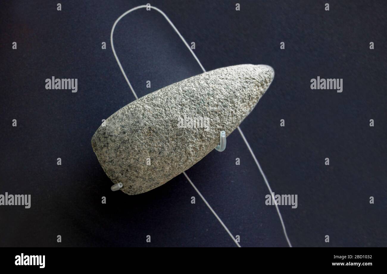 Barcelona, Spain - Dec 27th, 2019: Argaric Culture Diorite Axe. 2200 BC. Catalan Museum of Archaeology, Barcelona, Spain Stock Photo
