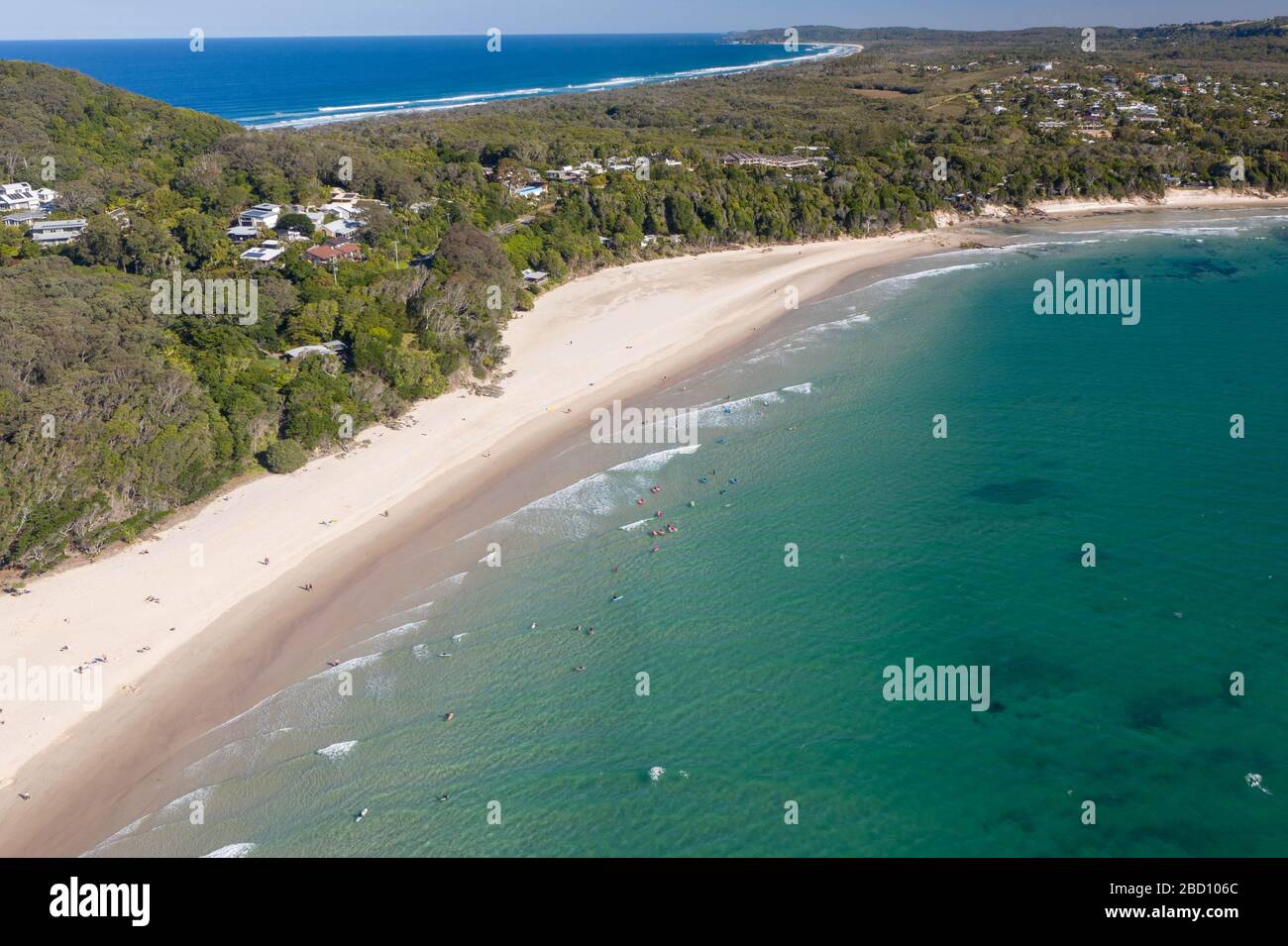 (EDITOR NOTE: Photo taken with a drone)A view of a busy beach at Byron Bay. New South Wales and Queensland cities decide to shutdown beaches. Australian authorities are taking actions to reduce crowded places including beaches to stop the spread of Covid-19. Stock Photo