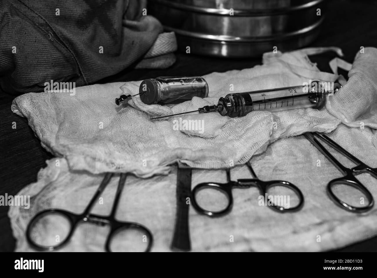 Surgical instruments covered with gauze. Lying on the table in the operating room Stock Photo