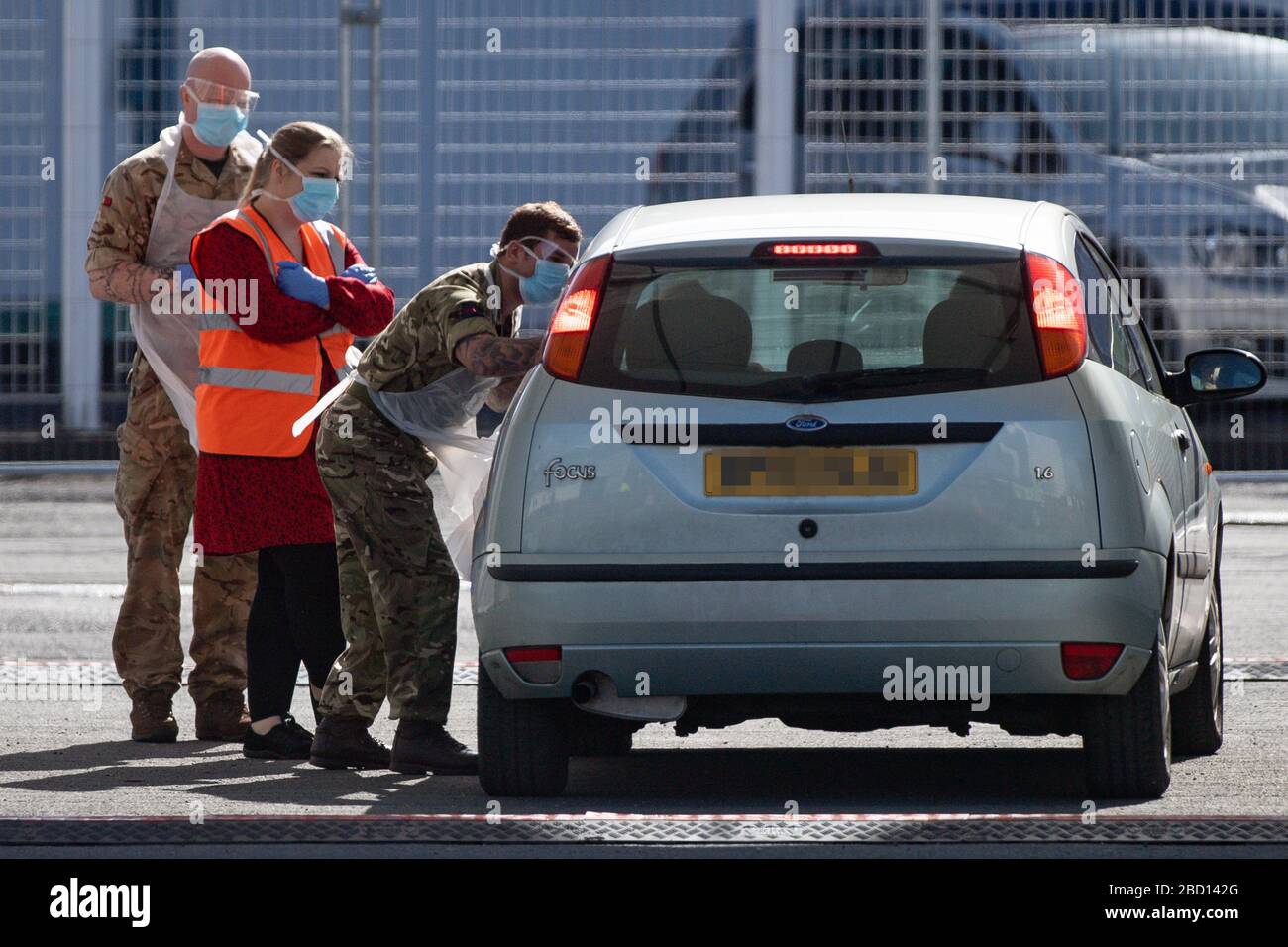 EDITORS NOTE: NUMBER PLATE PIXELATED BY PA PICTURE DESK Picture taken at 1021am of military personnel help administer Covid19 tests for NHS workers at Edgbaston cricket ground in Birmingham, as the UK continues in lockdown to help curb the spread of the coronavirus. Stock Photo