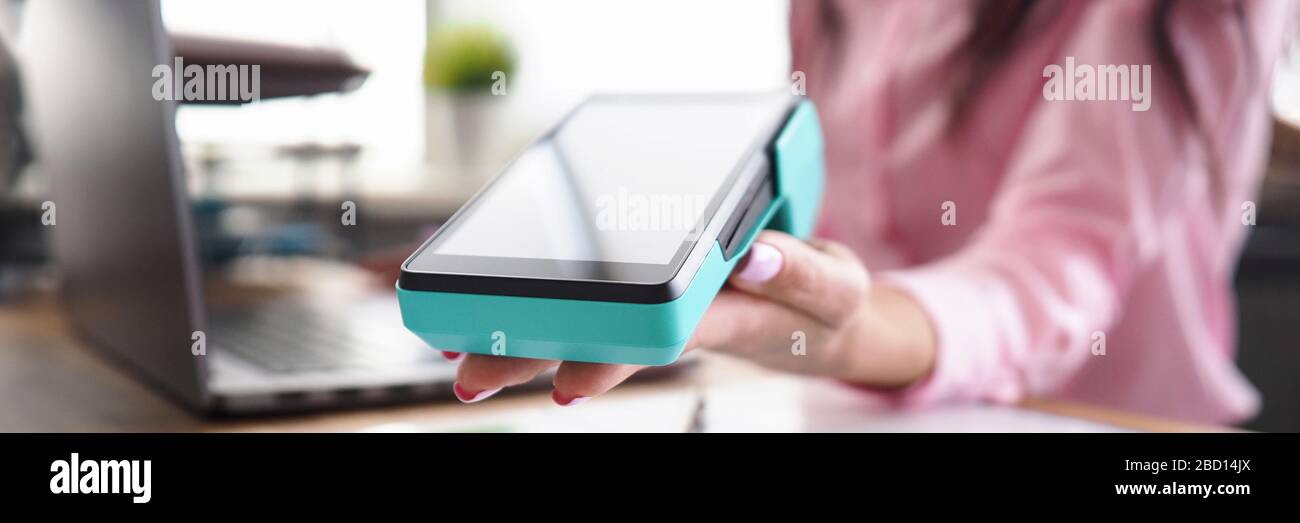 Woman helping pay credit card Stock Photo