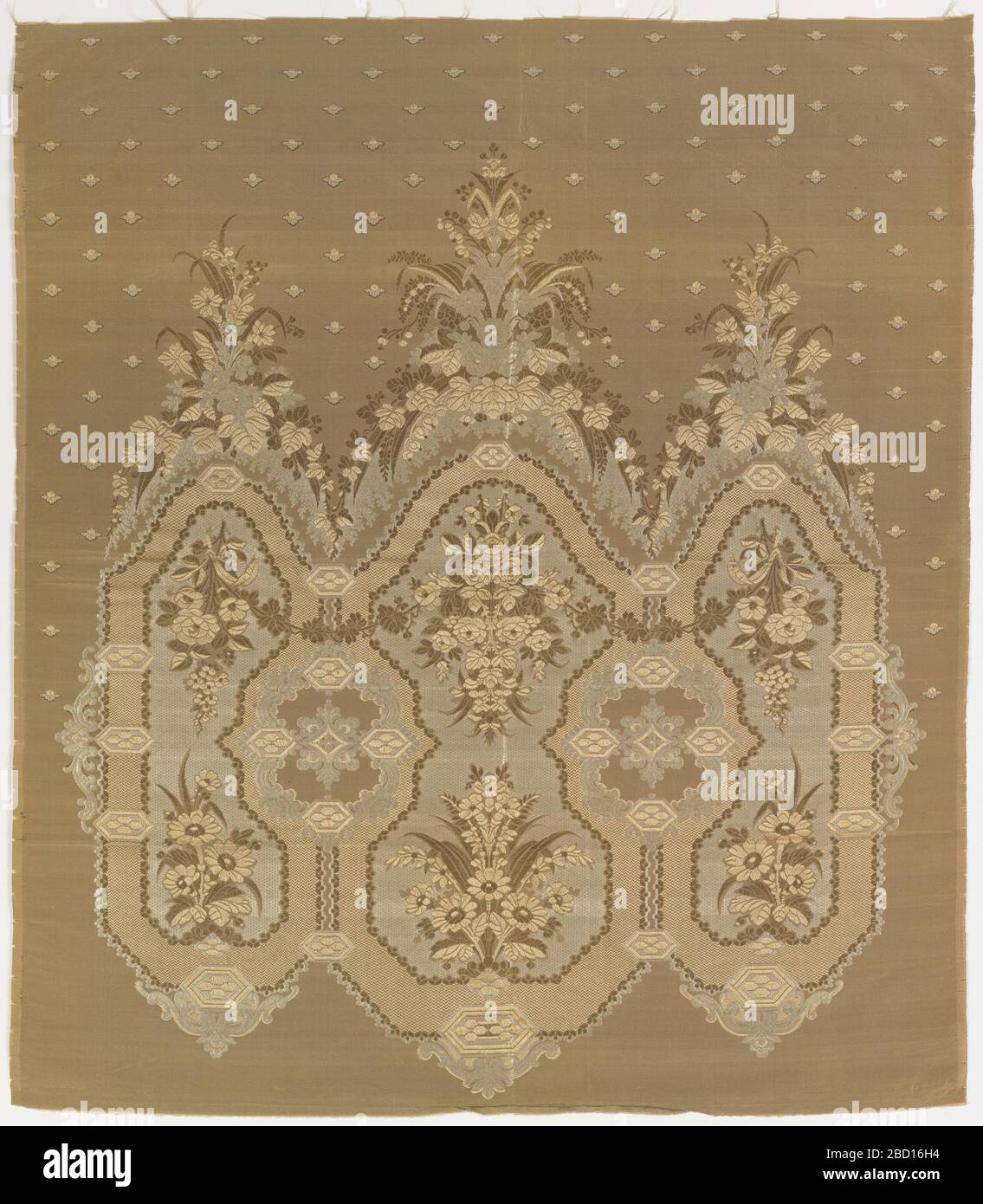 Panel. Research in ProgressOne repeat of a large symmetrical triple-crowned floral ornament against a grey-green ground with minute flowers. Ivory warp, beige weft. Panel Stock Photo