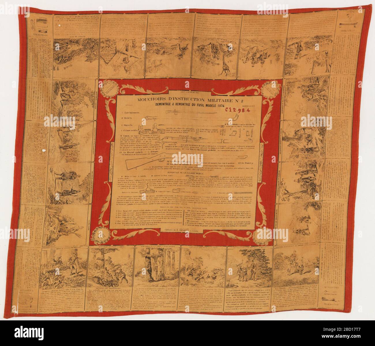 Muchoirs Dinstruction Militaire. Research in ProgressRed cotton handkerchief printed with black design on cream ground showing military activities. At center are instructions on instruction on the stripping and assembly of the 1886M93 Lebel rifle. Muchoirs Dinstruction Militaire Stock Photo