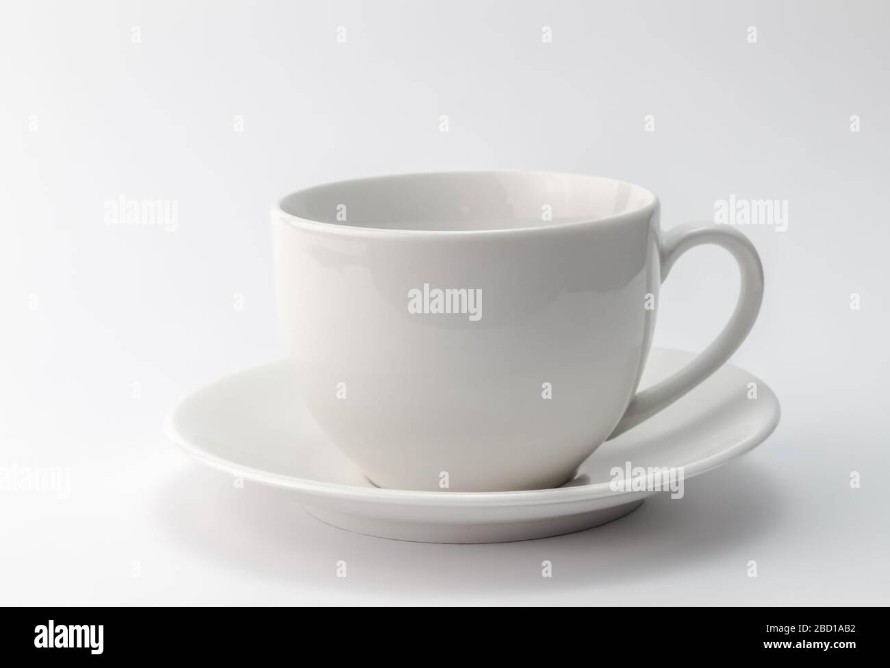 White cup and saucer isolated on white background with copy space Stock ...