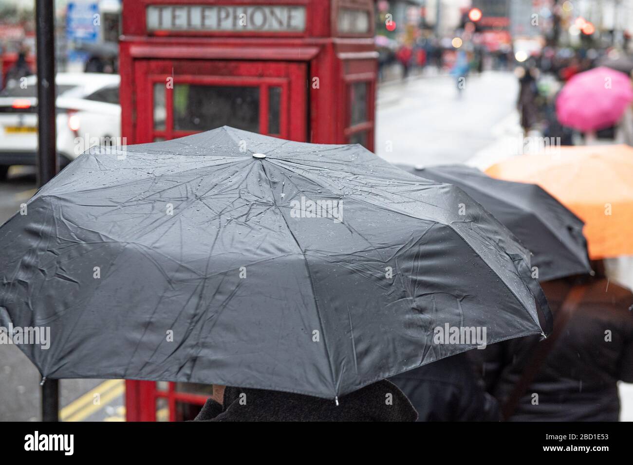 Umbrellas on a rainy day in london Stock Photo Alamy